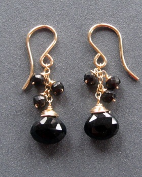 Featured is a photo of a pair of artisan-made black onyx earrings ... a lovely example of artisan jewelry. 